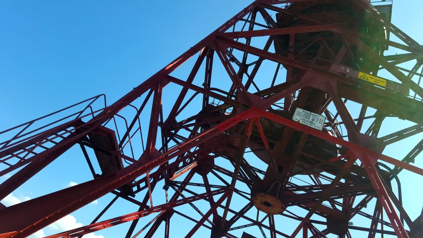 the structure is tall and red in color