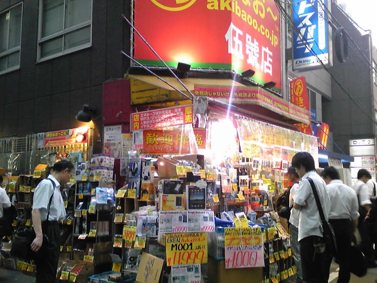 many asian people and a sign with many signs