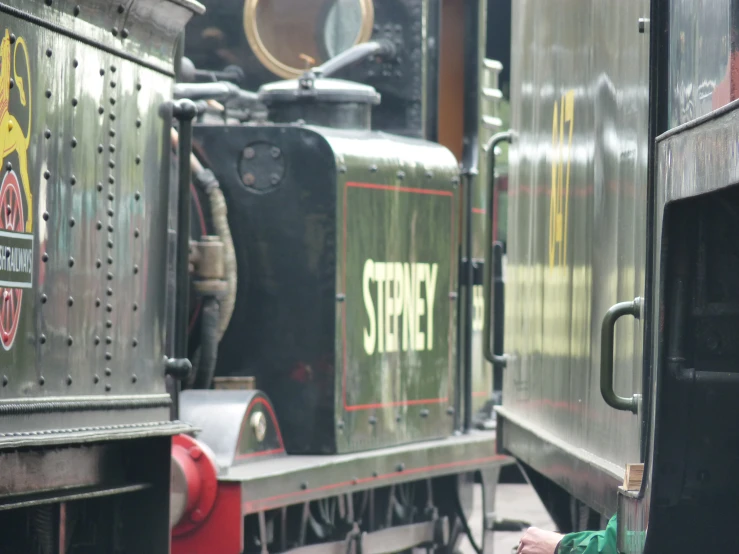 a large locomotive engine is sitting by itself