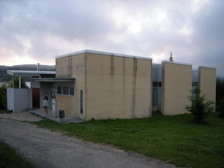 a building with grass in front of it