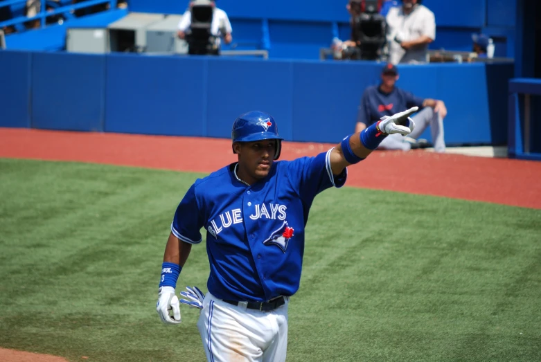 a professional baseball player getting ready to catch a ball