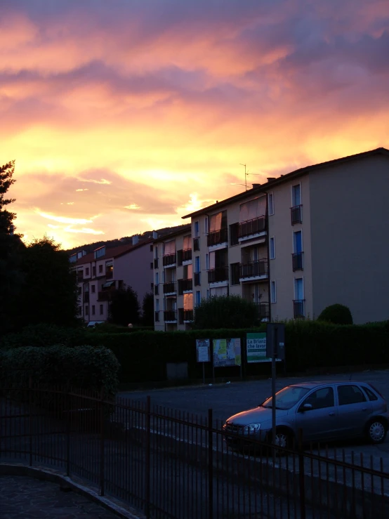 a car parked on the street at dusk