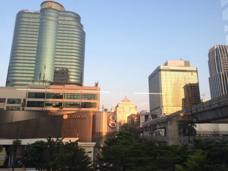 a city skyline with buildings and traffic lights