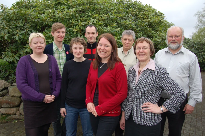 a group of people posing for a po