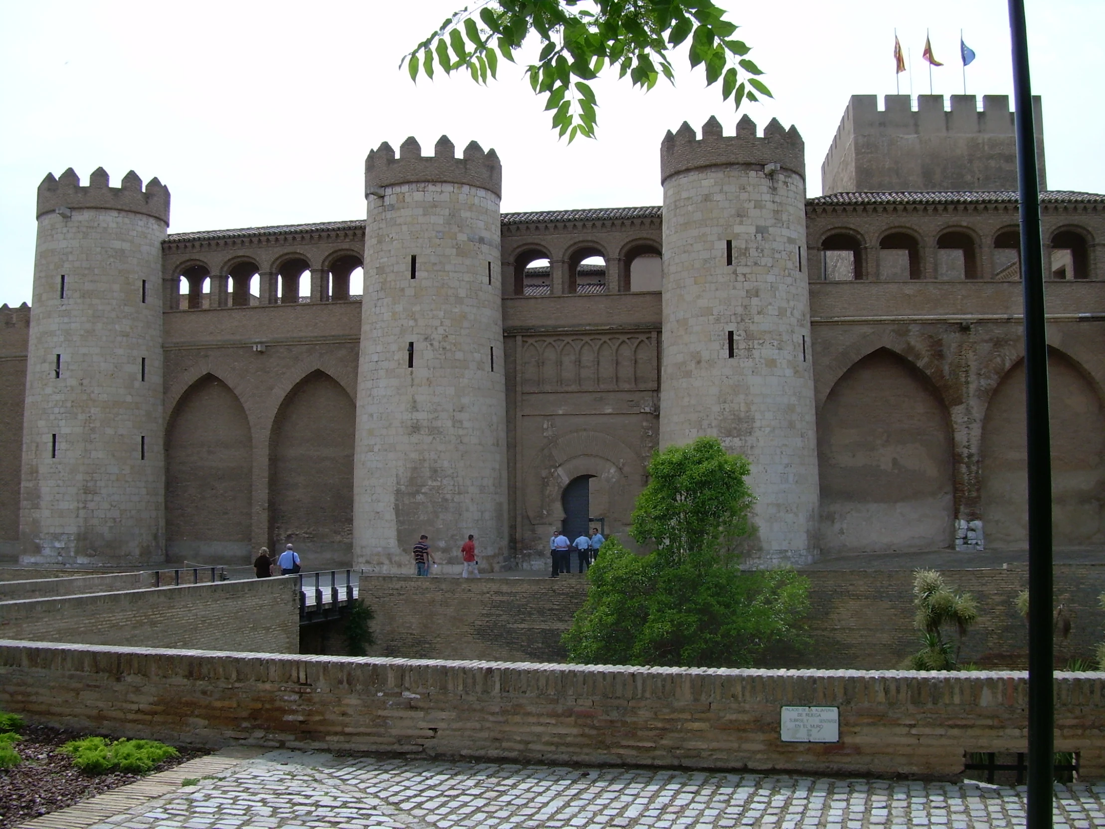 a tall brick building with an entrance