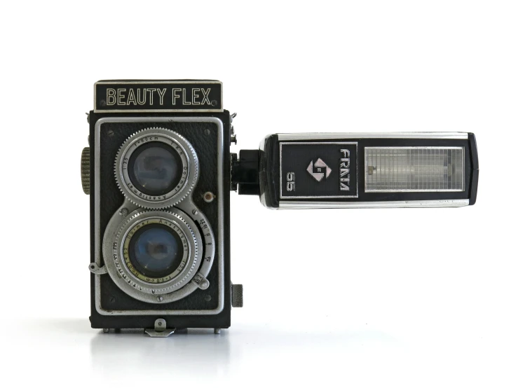 a camera with two lens and a body attached