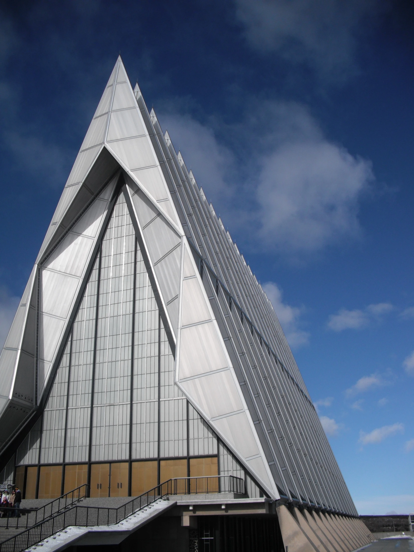 the triangle shaped building has a very large triangle like design