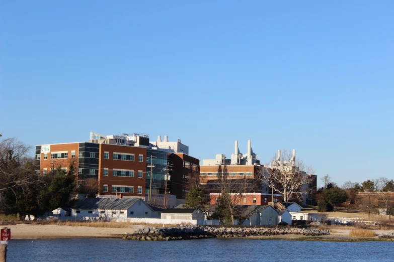 a boat is out in the water with buildings on top