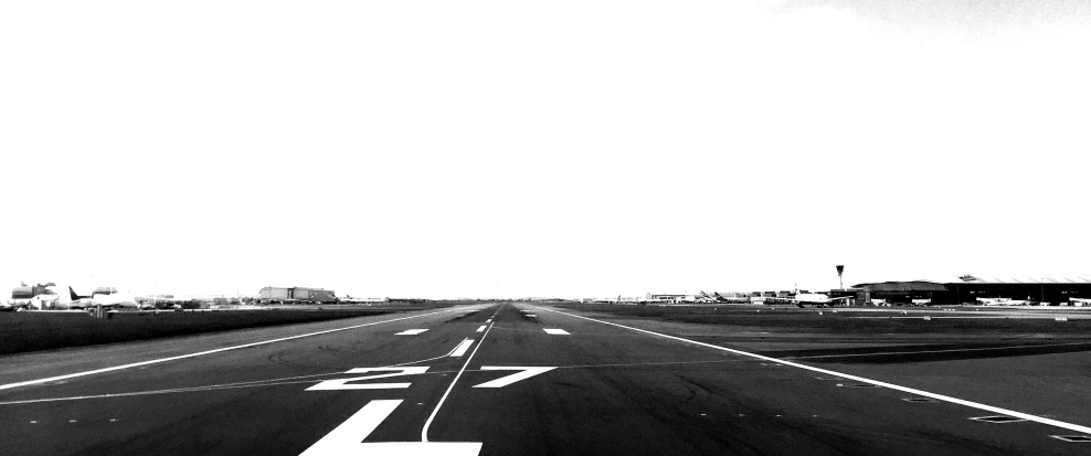 a black and white po of an airport runway