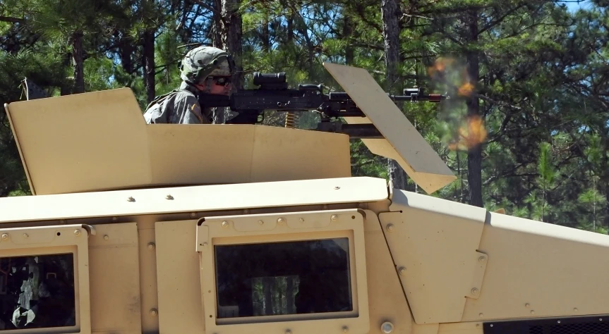 an image of a man in action on the vehicle