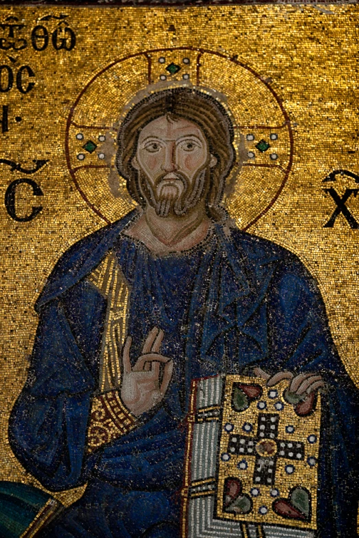 a mosaic is shown with a religious figure on it