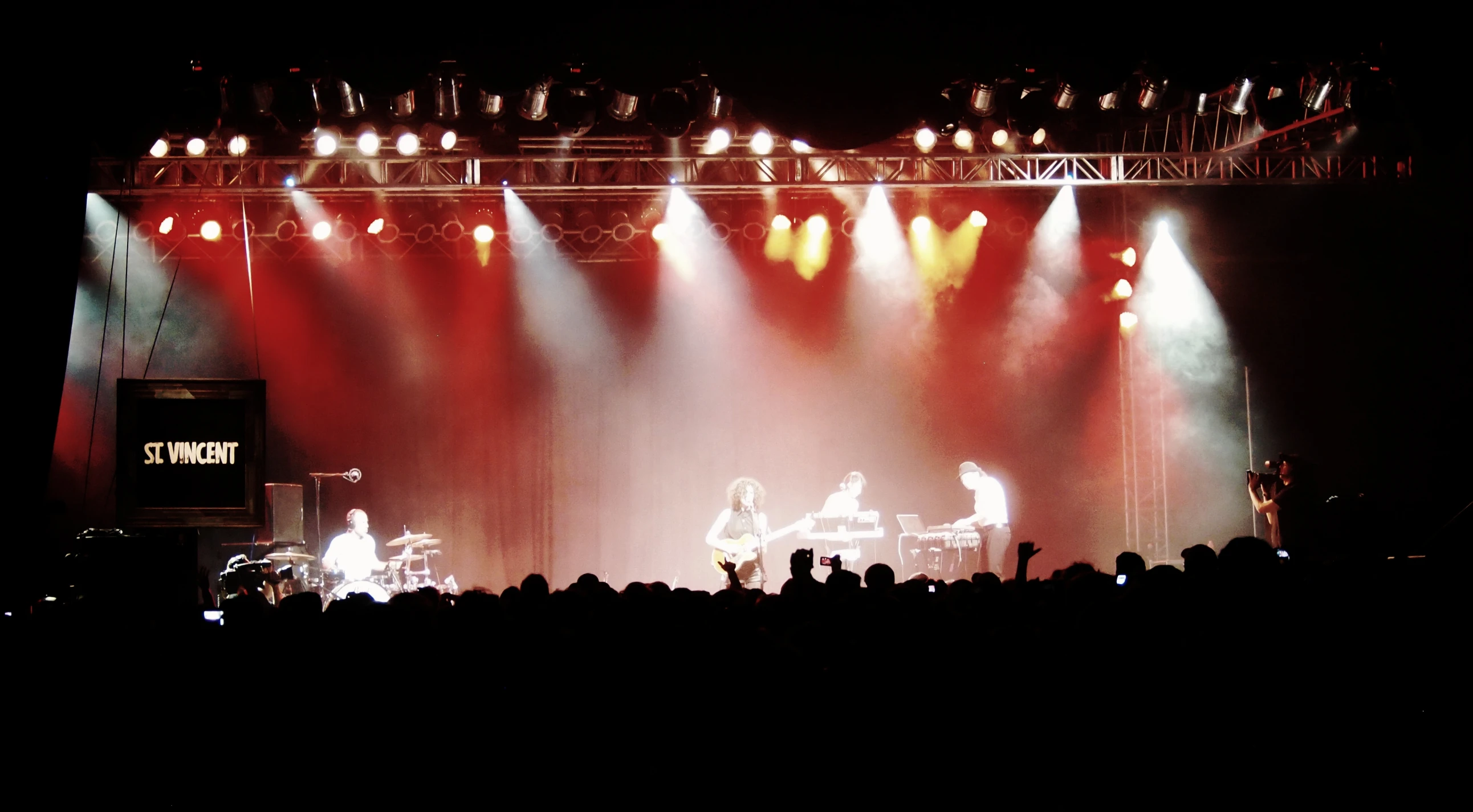 concert lights on a stage with musical playing