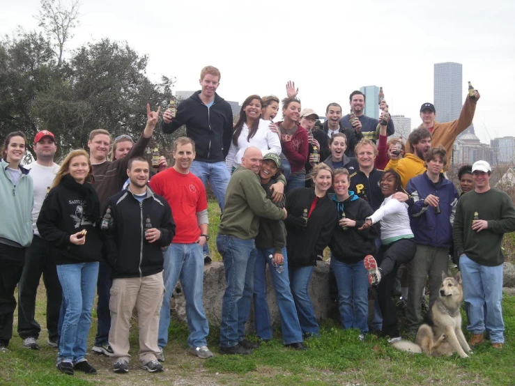 a large group of people posing for a picture