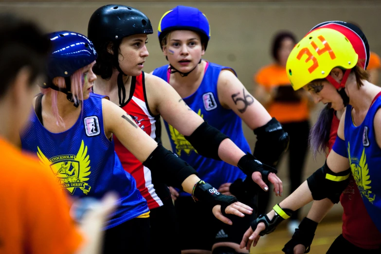 a team of people are playing roller skate together