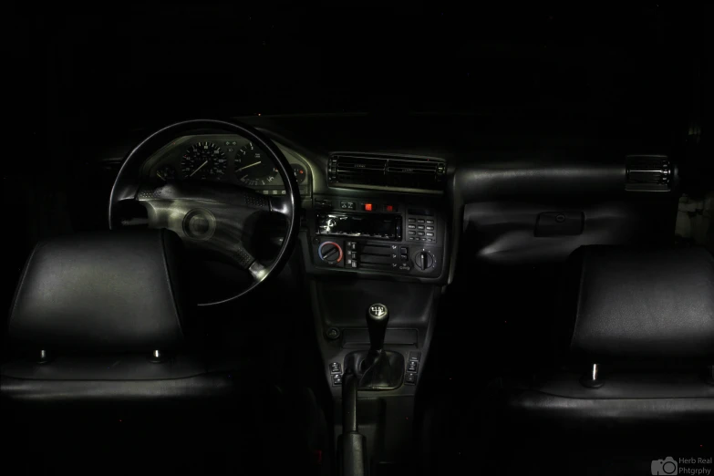 a dash board, radio and dash light in a car