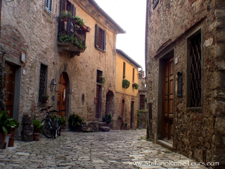 a street in an old european village lined with buildings