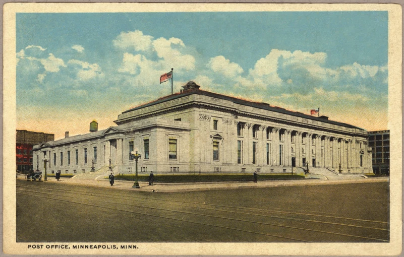 an old po of a building on the corner of a road