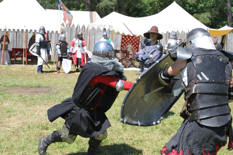 a group of people dressed up in costumes and armor