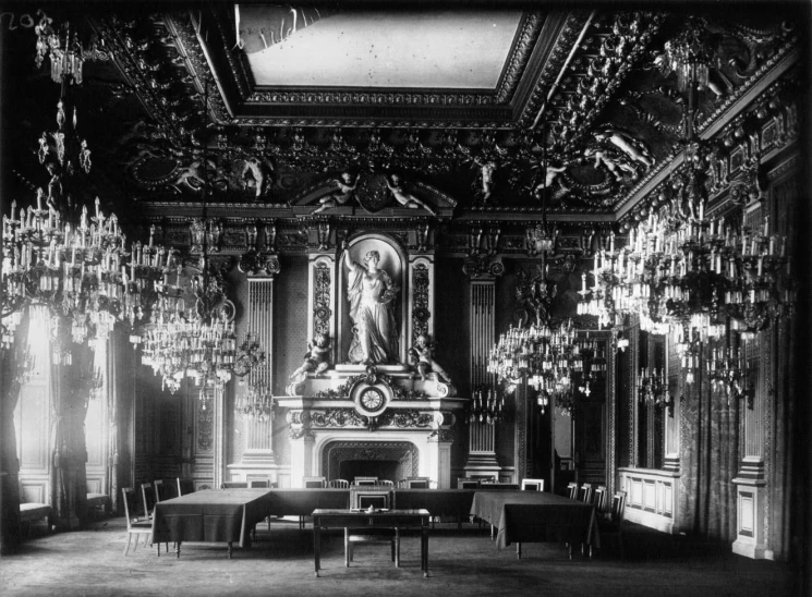 an ornate room is shown with chandelier hanging