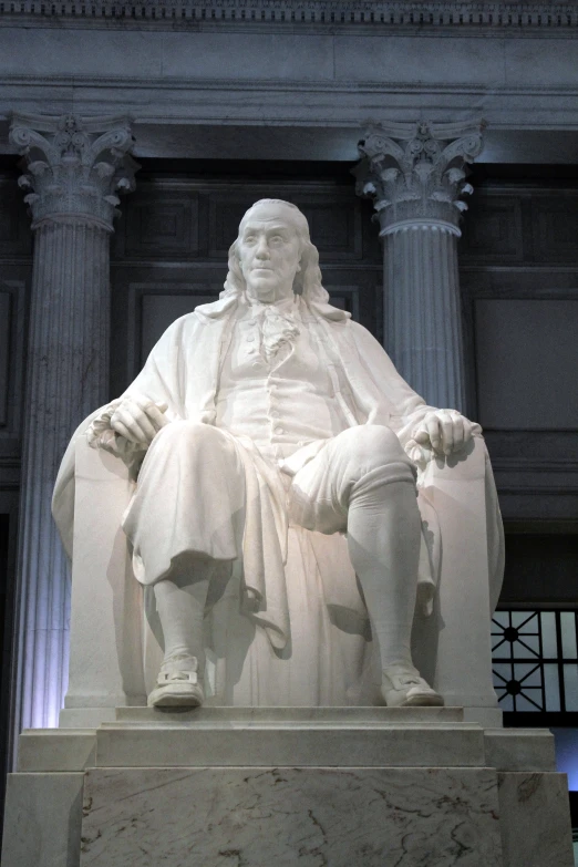 an image of a very statue on the side of a building