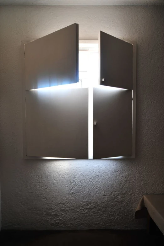 a bathroom with a sink, counter and cupboards in it