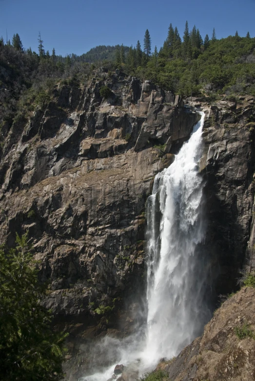 the view from high above of a waterfall