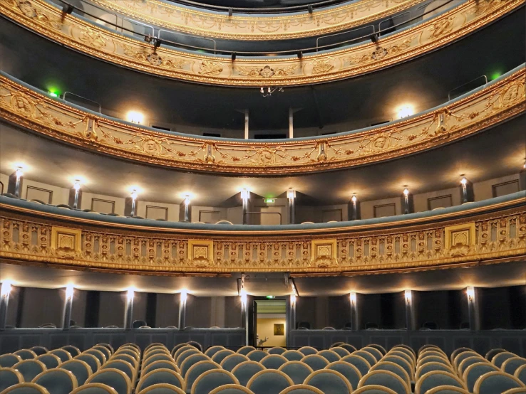 there is an auditorium with rows of seats