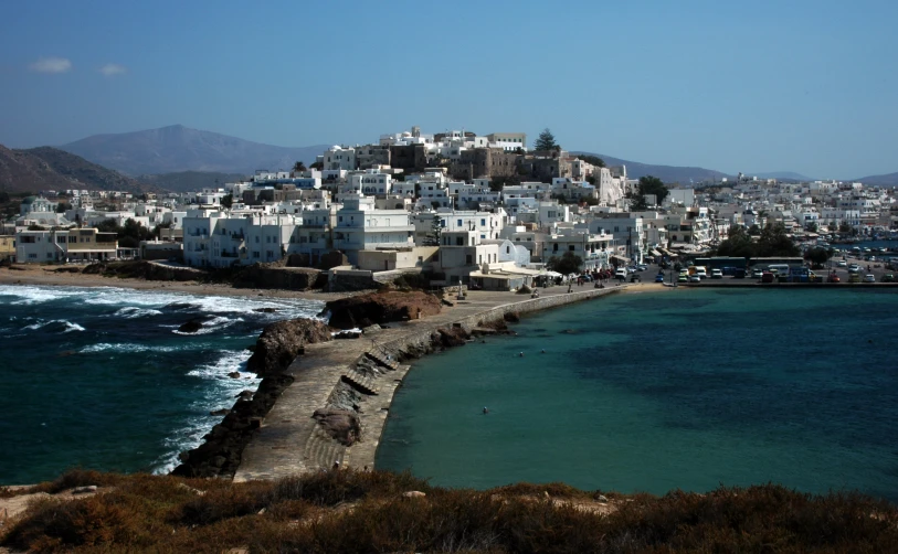 the houses on the mountain overlooking the blue ocean