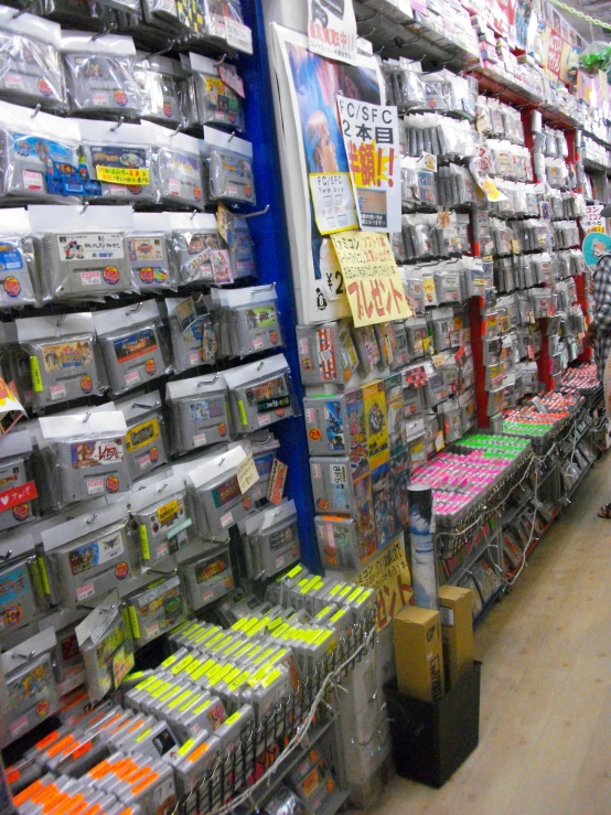 an aisle filled with many game consoles and other items