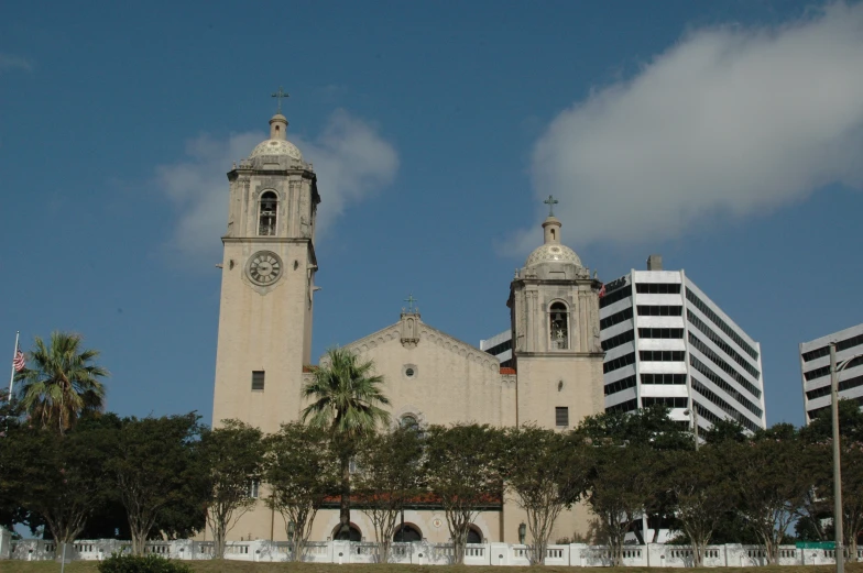 a large cathedral church surrounded by tall buildings