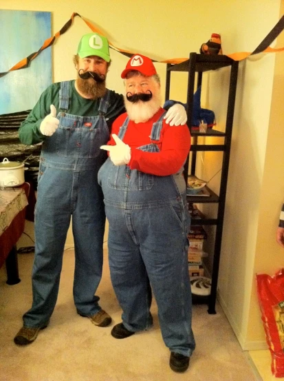 two statues of mario bros in work wear posing