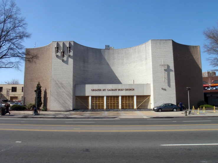 the church has two crosses hanging off it's side