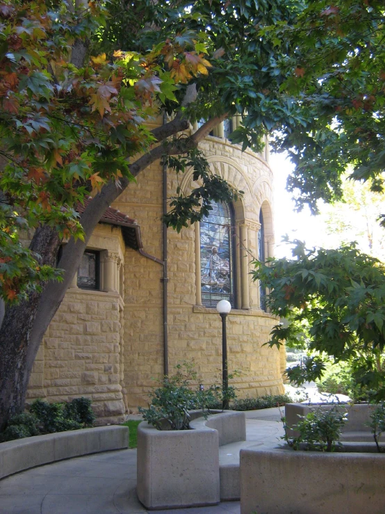 a yellow building with a clock in it