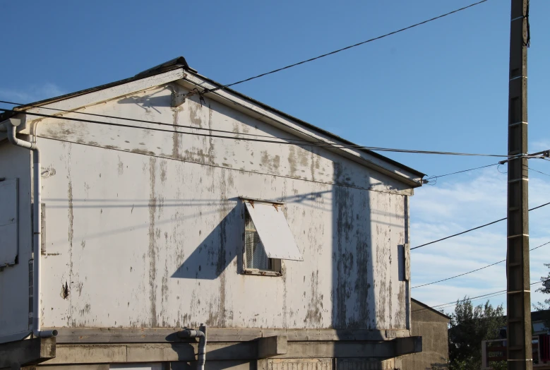 an old building that has a sign on the outside of it