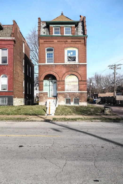 the house next to the curb has a fire hydrant in front