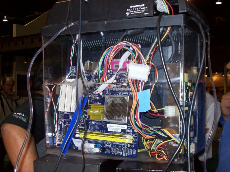 an electronic box with different wires and connectors