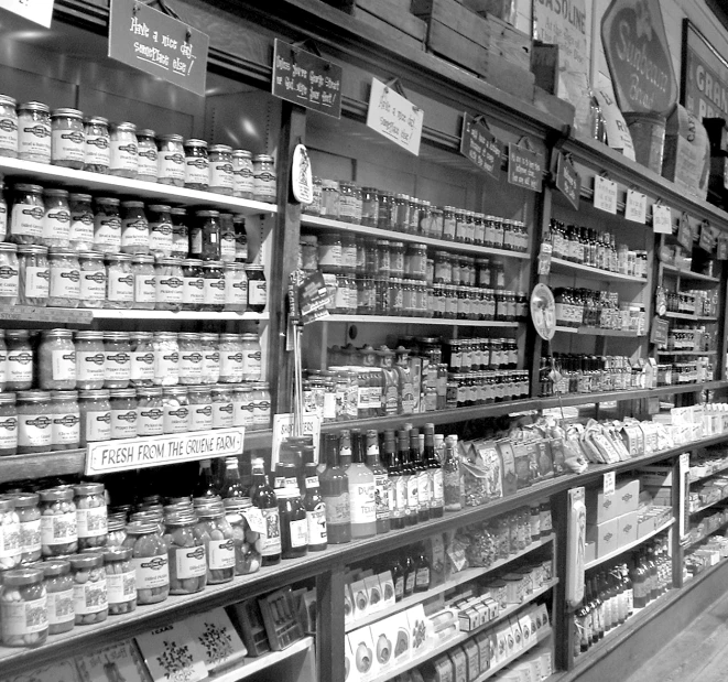 black and white image of various products and bottles