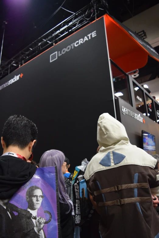 a group of people with hooded towels around their backs