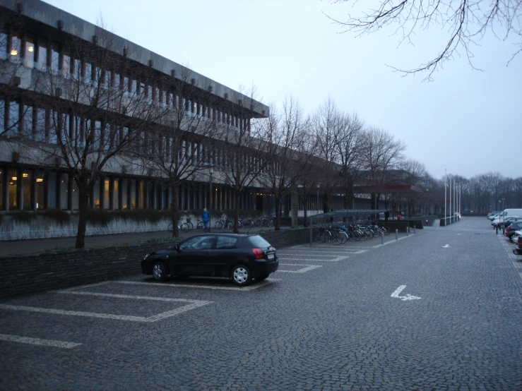 a parking lot with cars parked in it