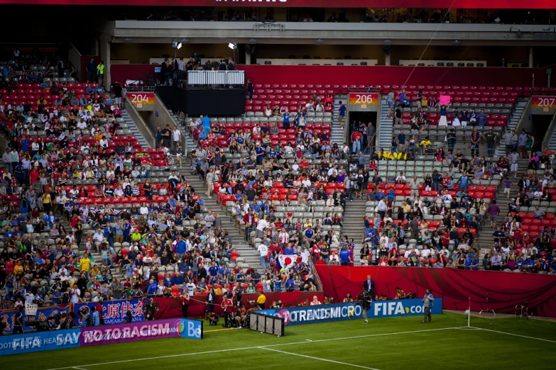 there is a stadium filled with spectators and fans