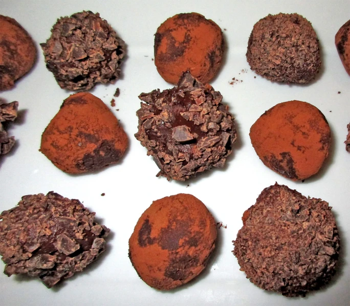 eight chocolate cookies sitting next to each other