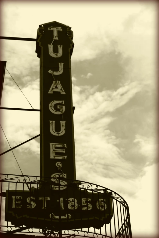 an image of a large sign on the roof of a building