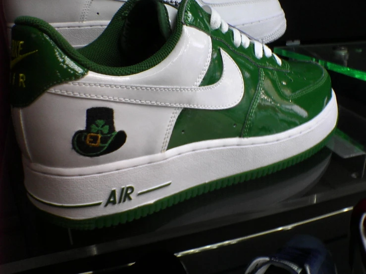 the nike air force 1 is decorated with a clover