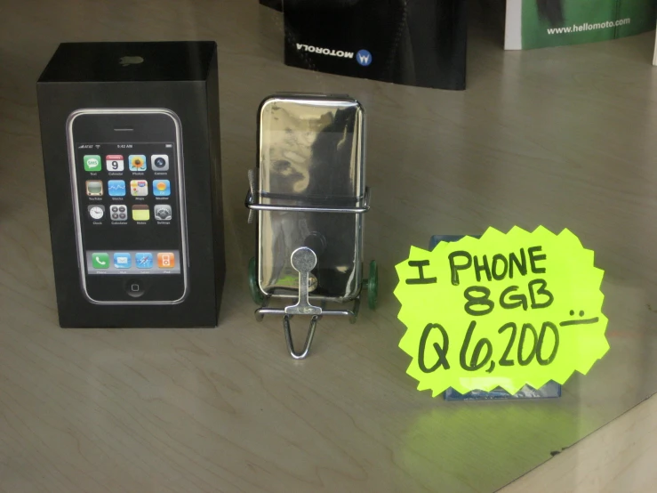 a cell phone and note for a year on the table