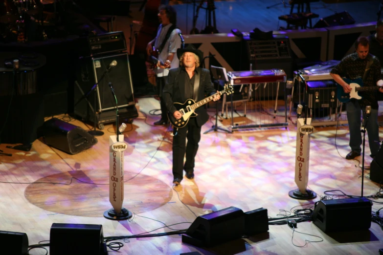 a man standing on top of a stage