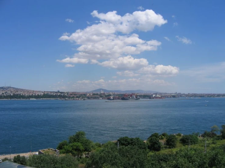 a wide view of the ocean and hills beyond