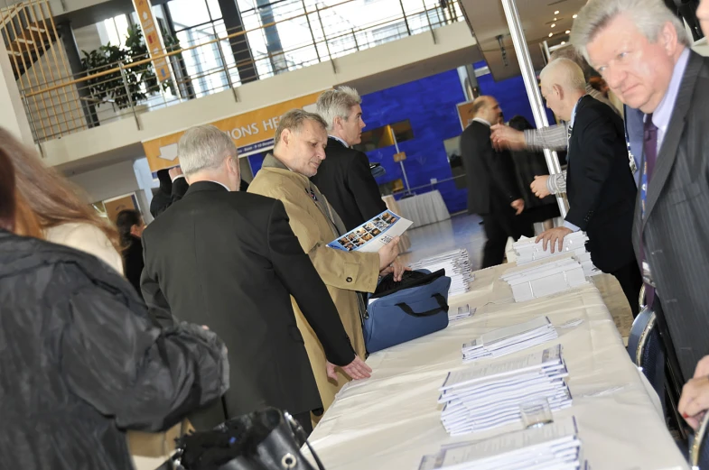 some people are in line to collect some books