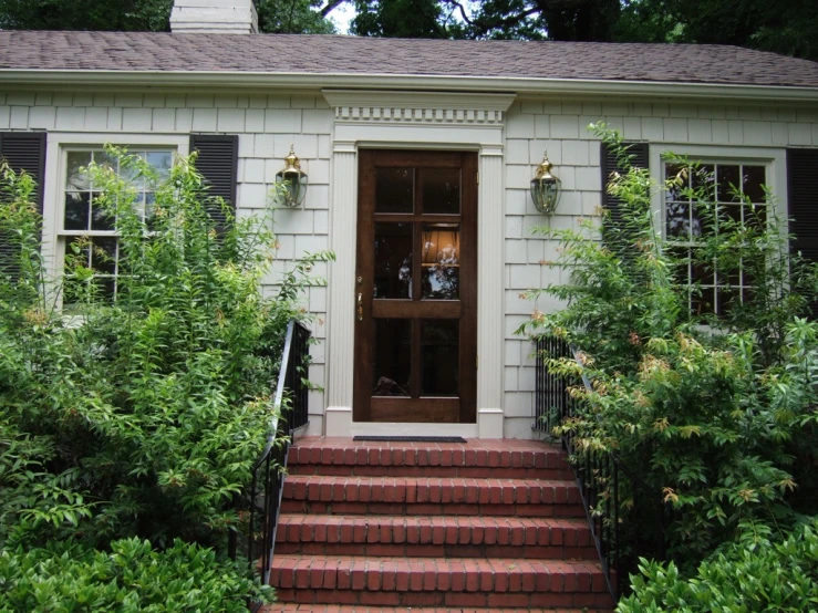 the steps are up to the door of the home