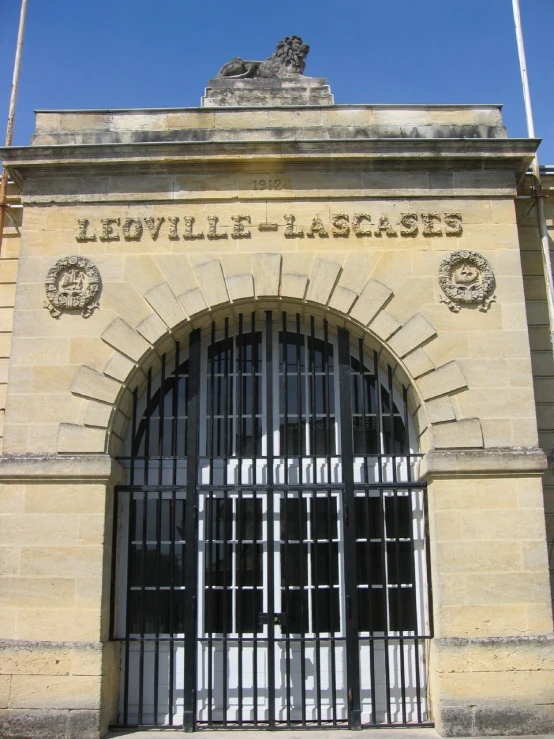 there is a building with bars on the front door