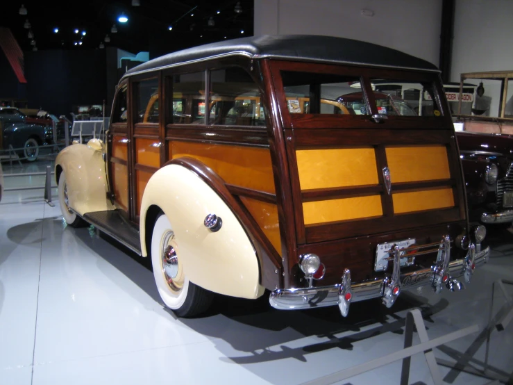 vintage car displayed at display during indoor gathering